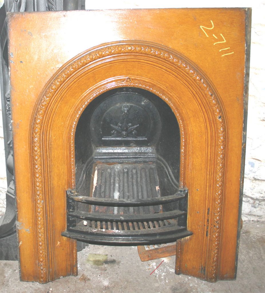 Small antique Victorian cast iron fireplace insert.-0
