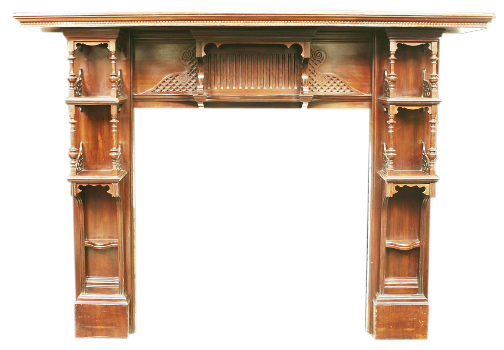 Antique mahogany fireplace in Chippendale style. -0